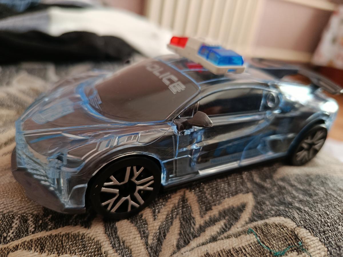 Colorful Glitter Toy Car with Lights, Music Police Vehicle Transparent Shell Toy Car, Omni-Wheel Children's Toys Novel Glow-in-the-Dark Gift Super Cool Birthday Present for Boys and Girls Ages 3-6 photo review