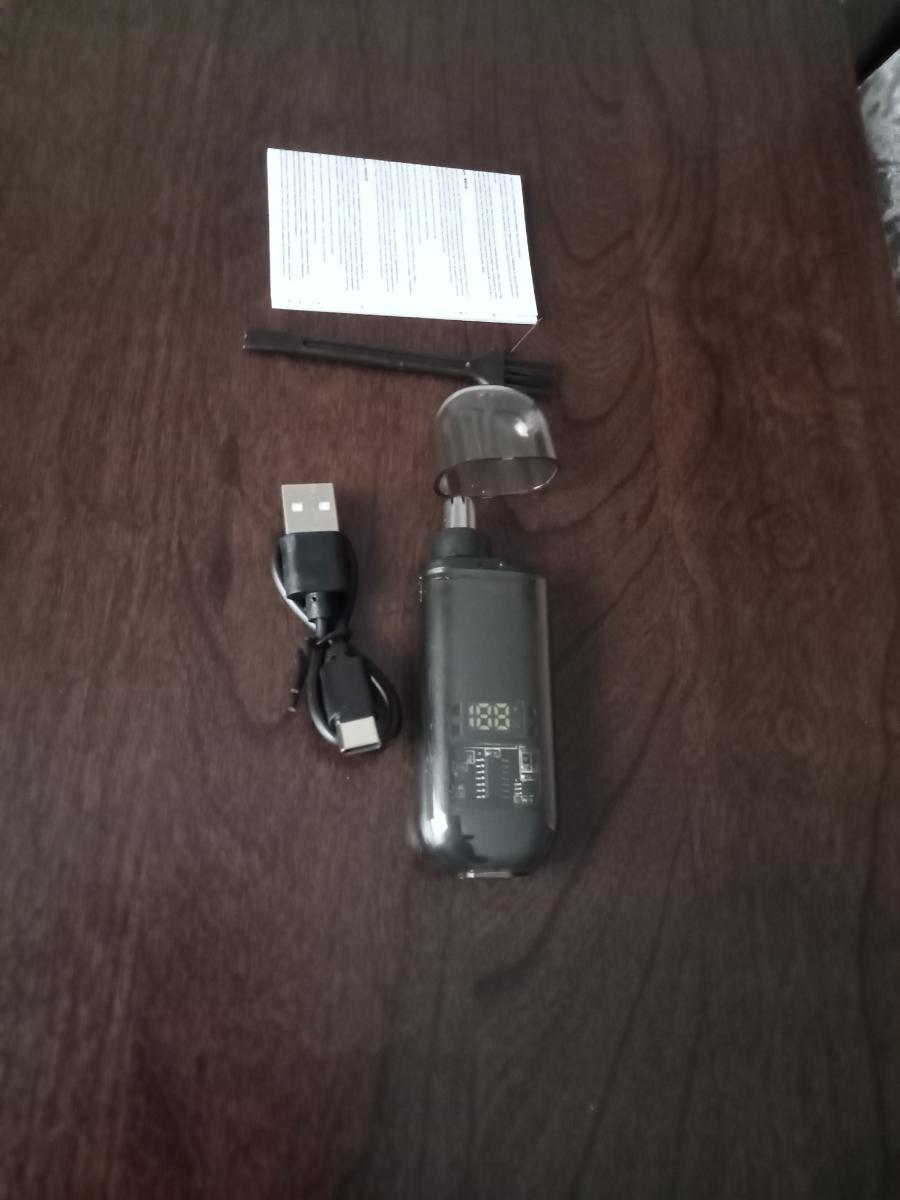 Огляд тримера для носа з Temu: розміром із запальничку, з USB-зарядкою та індикатором заряду — фото покупця