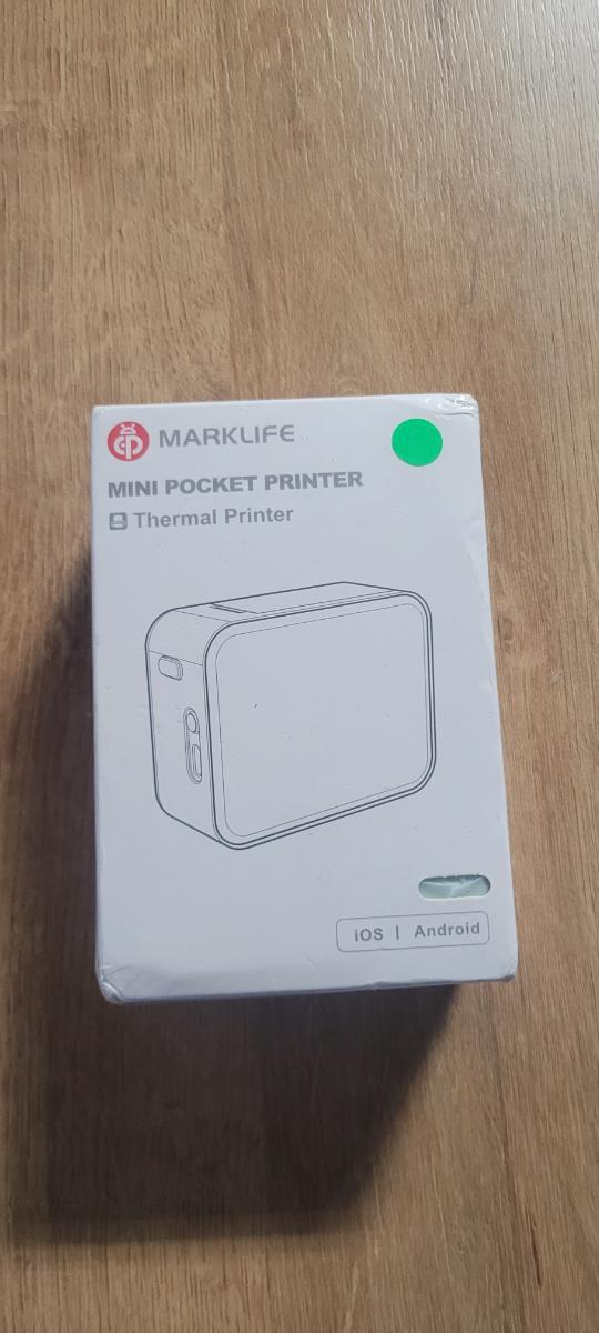 Портативний термопринтер етикеток marklife P15 (біла наклейка — фото покупця