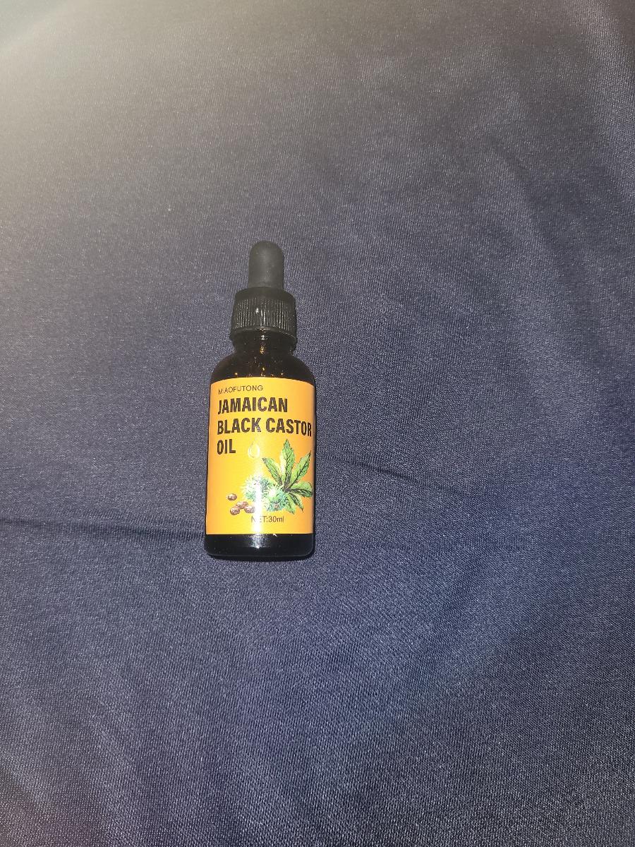 Castor Oil 30Ml/1.05 Fl Oz. with Ginger Oil, Rosemary, Biotin, Polygonum Multiflorum, And Batana Oil. Suitable for Hair And Eyebrows, Moisturizing And Smoothing. Ready to Use, No Rinsing Required photo review